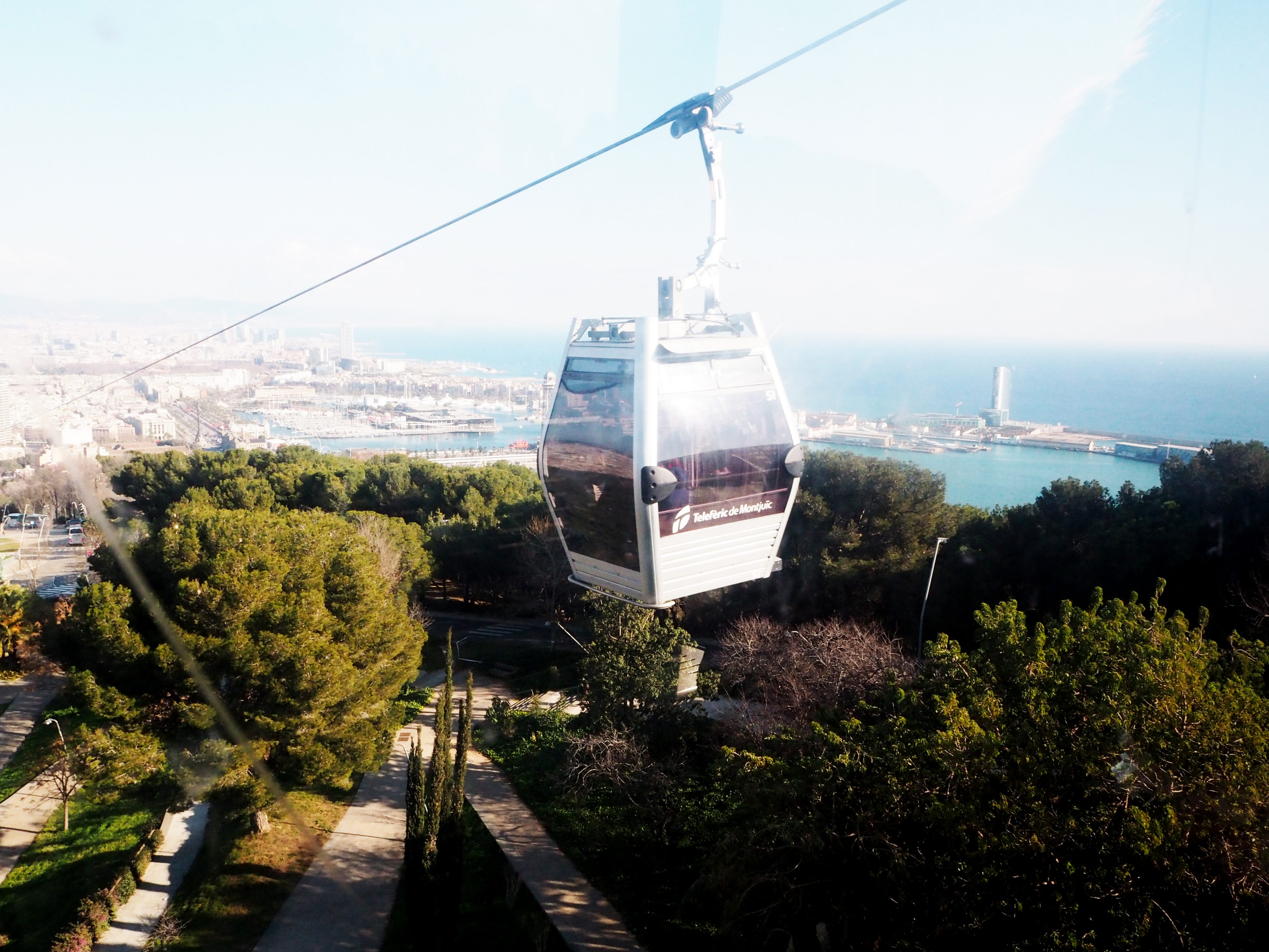 Cable car wagon with ocean in the background