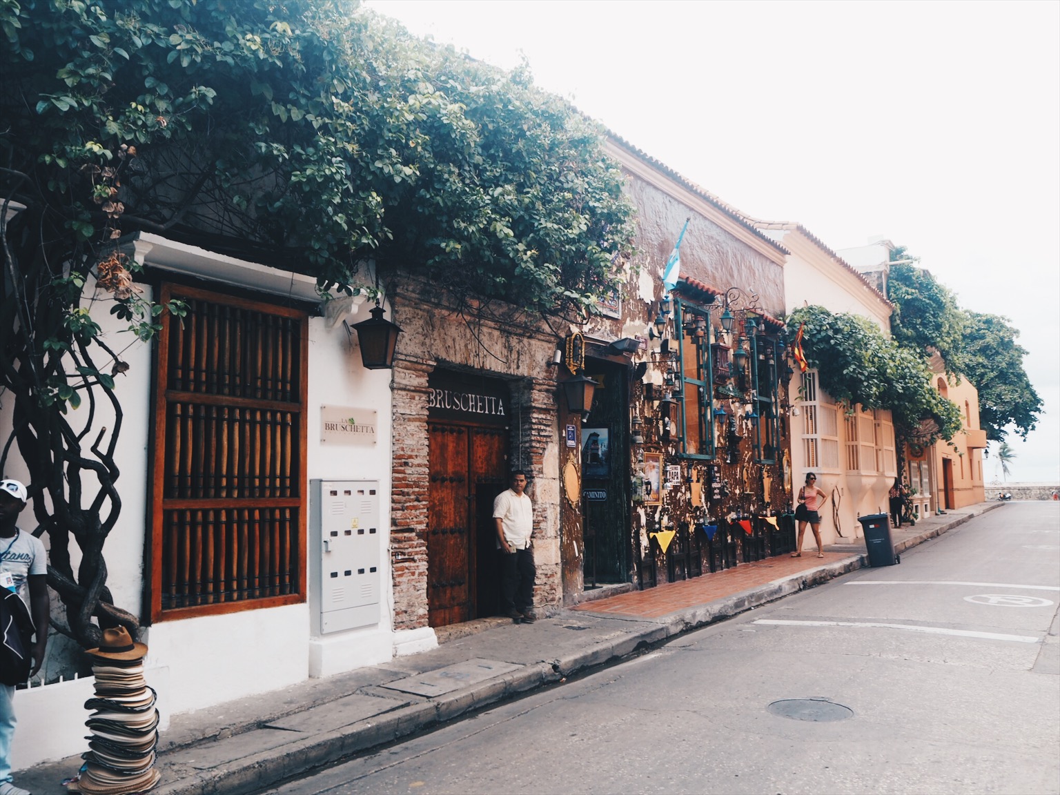 Brick buildings and people on the pavement