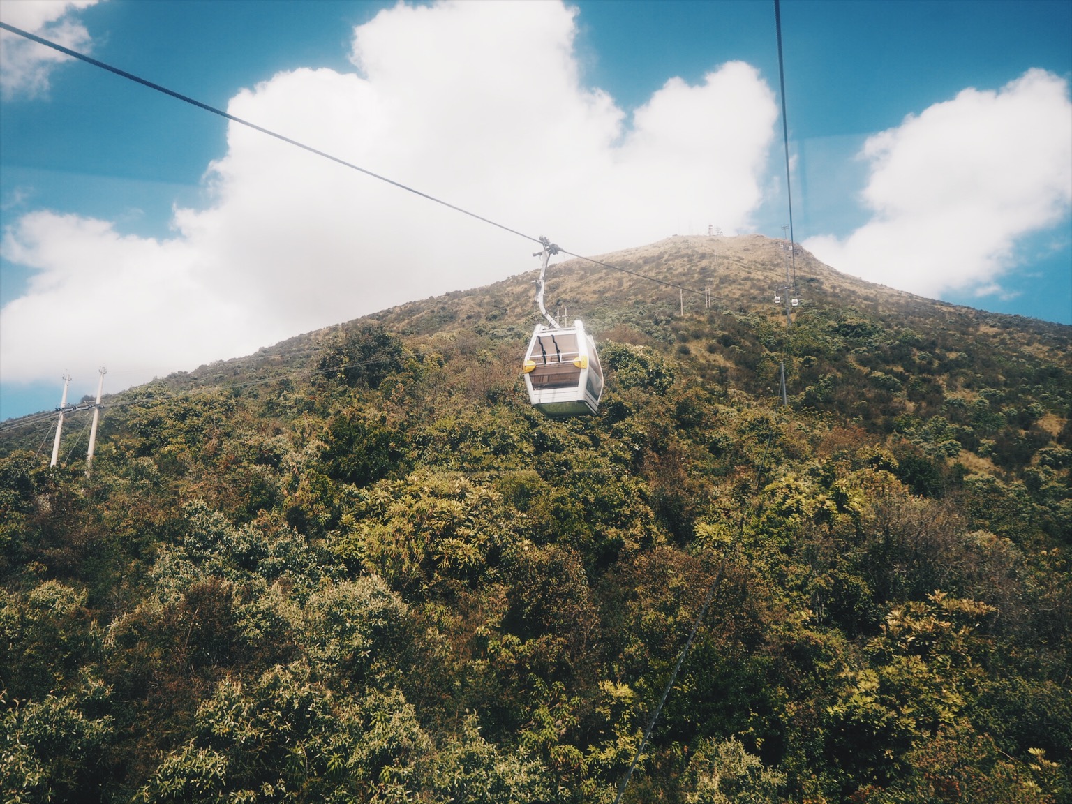 Cable car headed up mountain in Quito